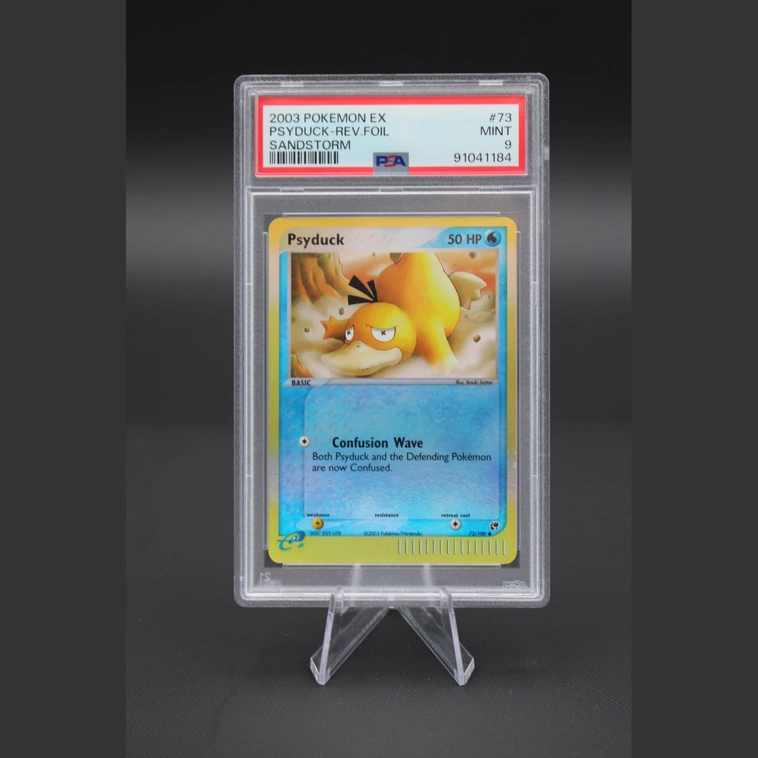 Psyduck · Sandstorm · 73/100 · Englisch · PSA 9 - Bild 1