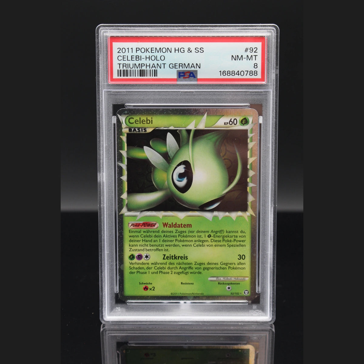 Celebi Holo · Triumph · 92/102 · Deutsch · PSA 8 - Bild 1