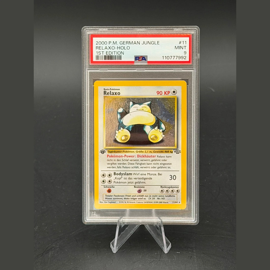 Relaxo Holo · Dschungel 1st Edition · 11/64 · Deutsch · PSA 9 - Bild 1
