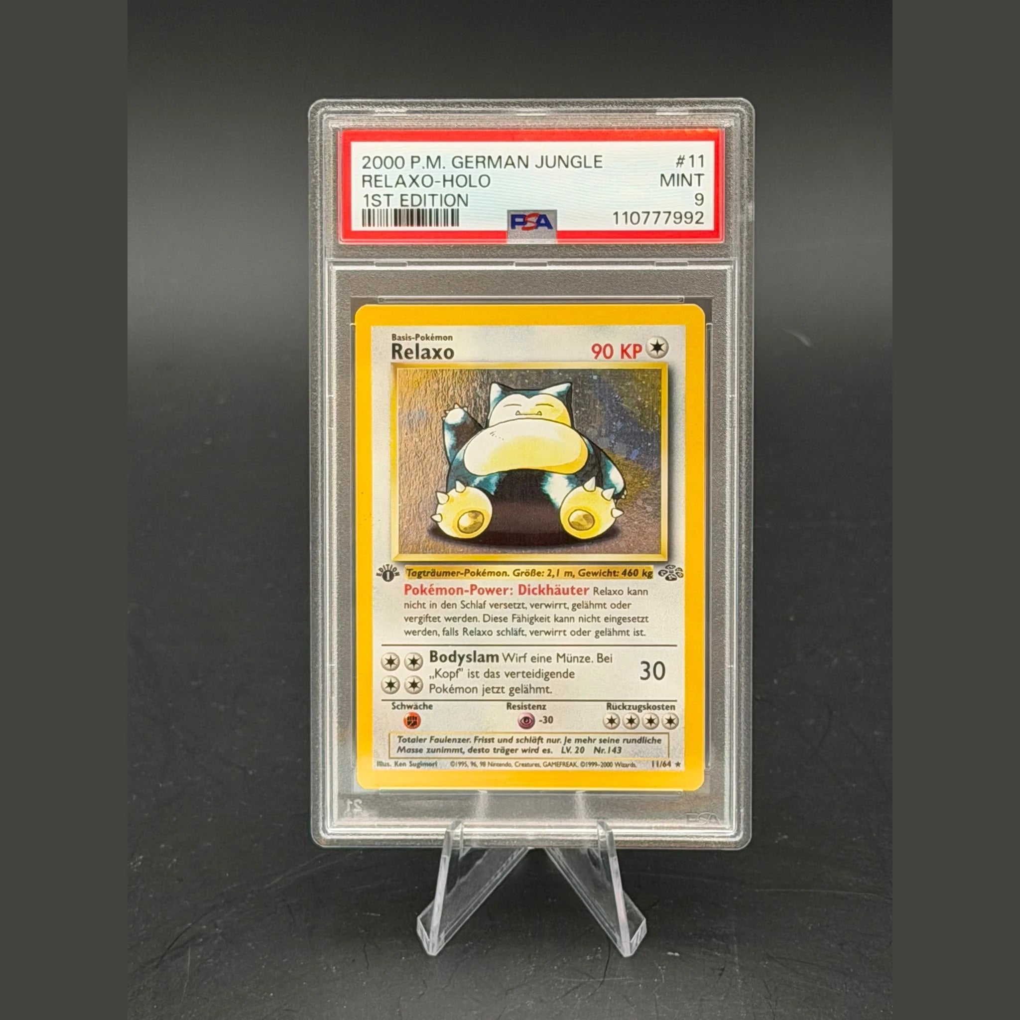 Relaxo Holo · Dschungel 1st Edition · 11/64 · Deutsch · PSA 9 - Bild 1